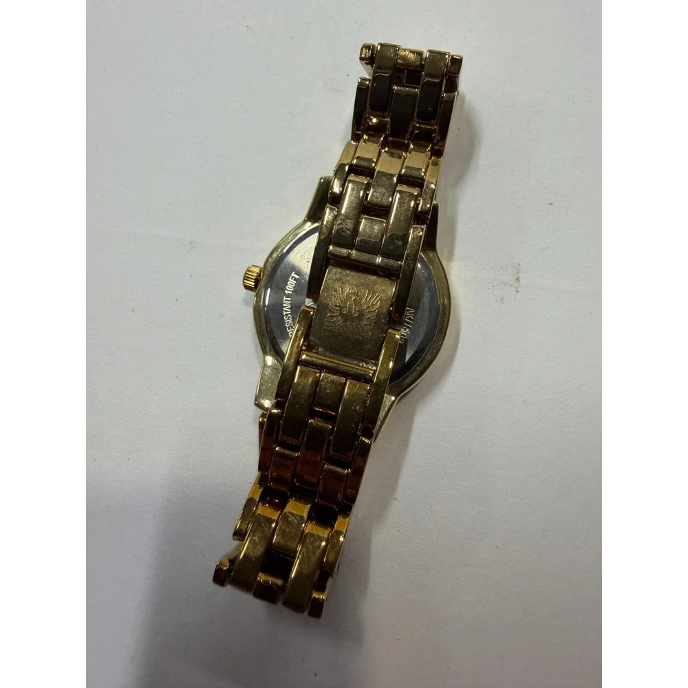 Anne Klein Womens Gold Tone Crystal Bezel Mother of Pearl Watch